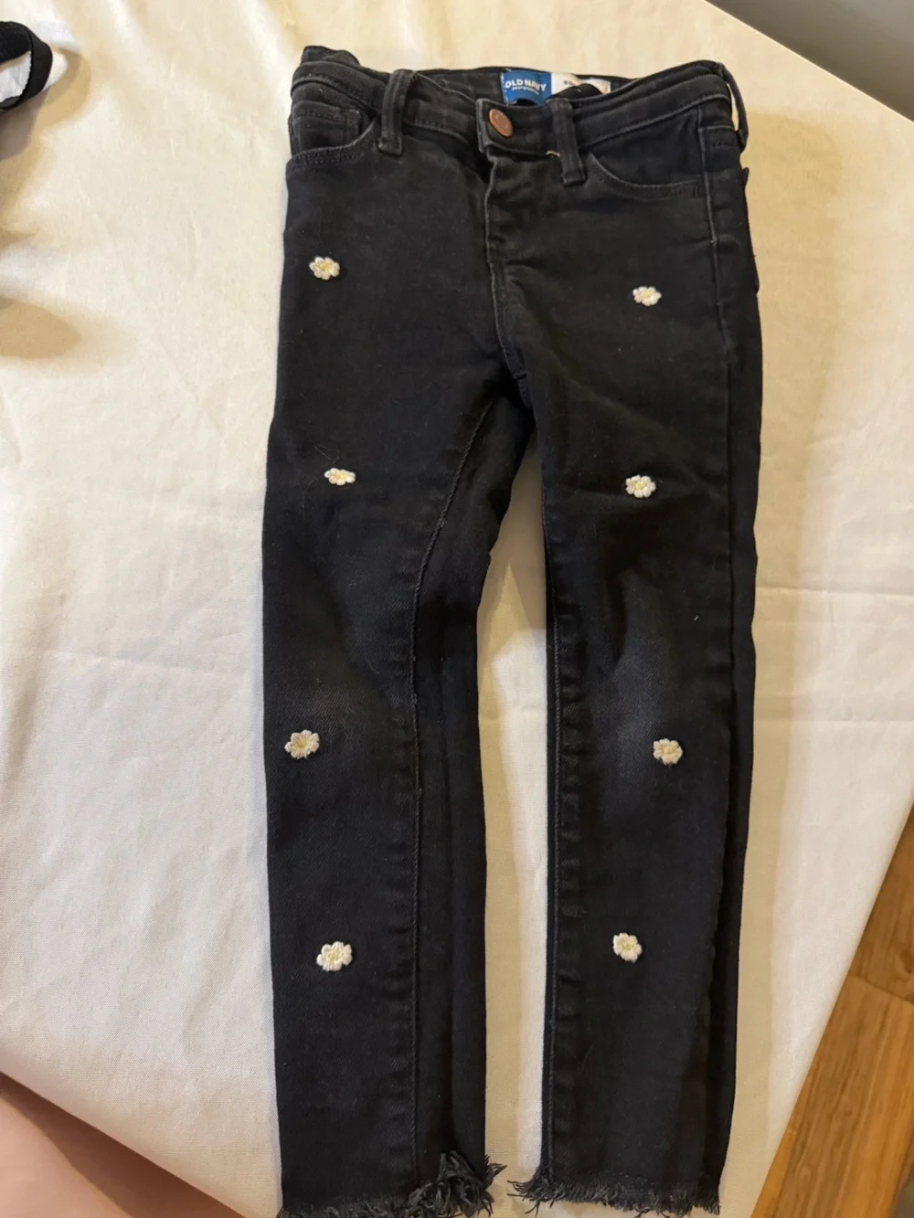 Set Old Navy Black Daisy Embellished Girls' Jeans and Black asymmetrical tank to